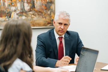 Chad Mooney meeting a client at PLDR Law in Lynchburg