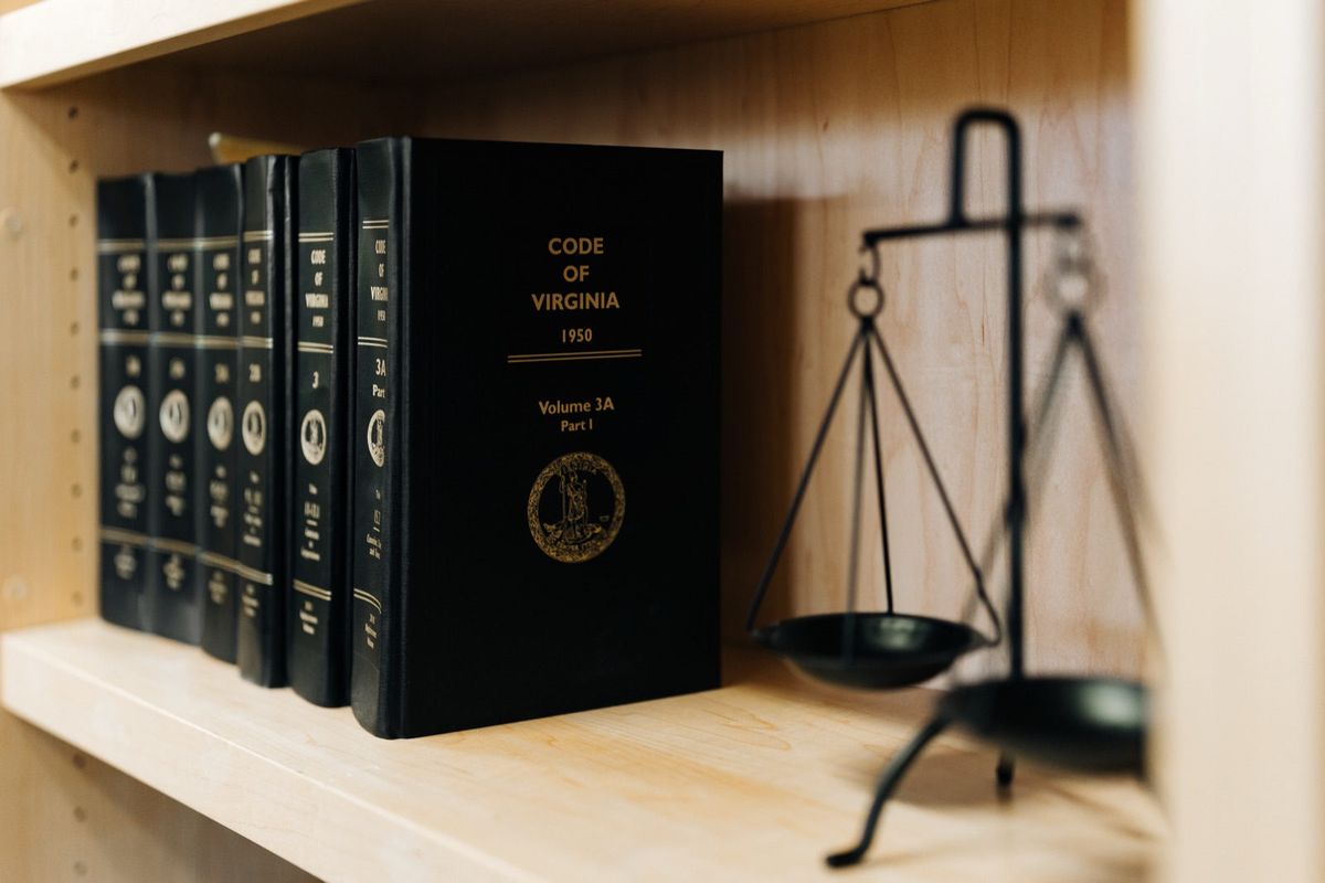 The Code of Virginia and scales of justice at PLDR Law